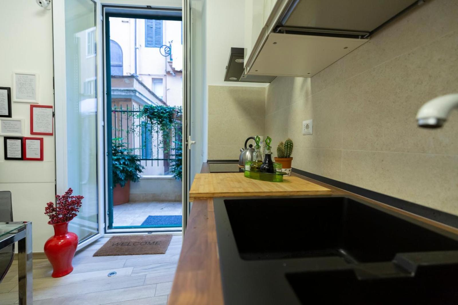 Flatinrome Trastevere Deluxe Rooms - Green Patio Eksteriør bilde